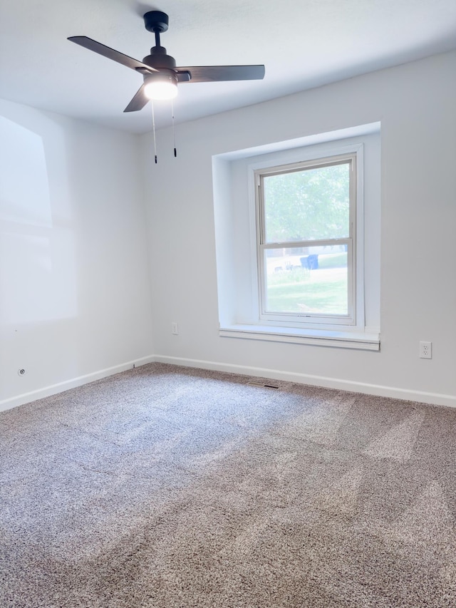 105 Horseshoe Dr, Nixa, MO 65714 - carpeted spare room with baseboards and a ceiling fan