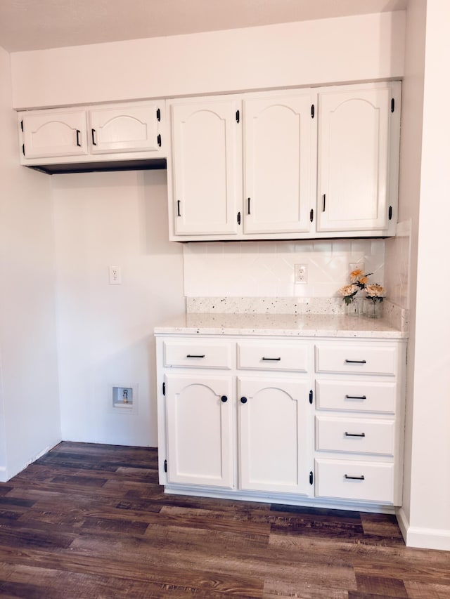 105 Horseshoe Dr, Nixa, MO 65714 - kitchen featuring white cabinetry, tasteful backsplash, and light stone counters