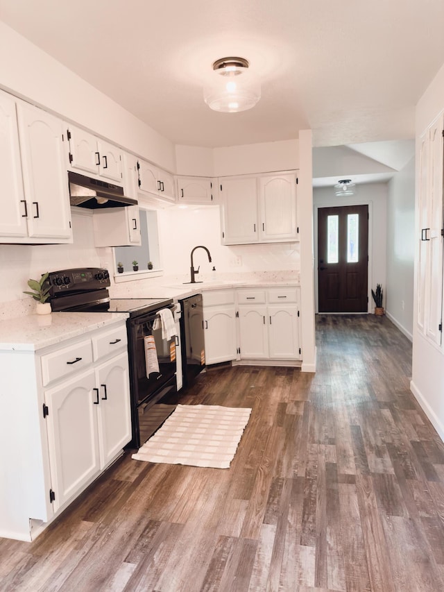 105 Horseshoe Dr, Nixa, MO 65714 - kitchen featuring electric range, under cabinet range hood, white cabinets, dark wood-style flooring, and light stone countertops