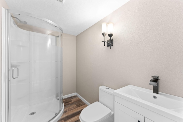 2505 Talking Rocks Rd, Branson West, MO 65737 - full bath with wood finished floors, a stall shower, and vanity