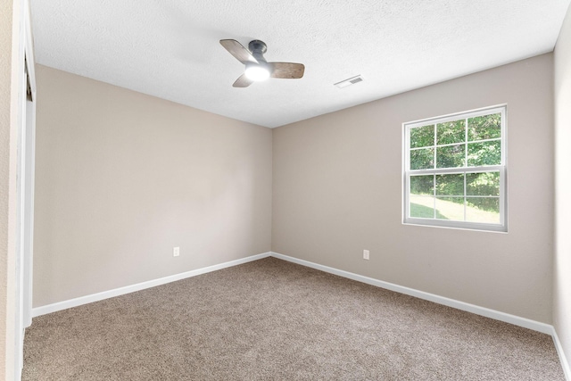 2505 Talking Rocks Rd, Branson West, MO 65737 - carpeted spare room featuring a ceiling fan and a textured ceiling