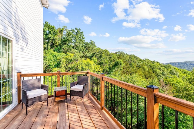 2505 Talking Rocks Rd, Branson West, MO 65737 - wooden terrace featuring a wooded view