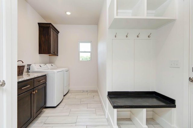 1604 N Bristol Ave, Springfield, MO 65802 - washroom featuring cabinet space and washer and clothes dryer