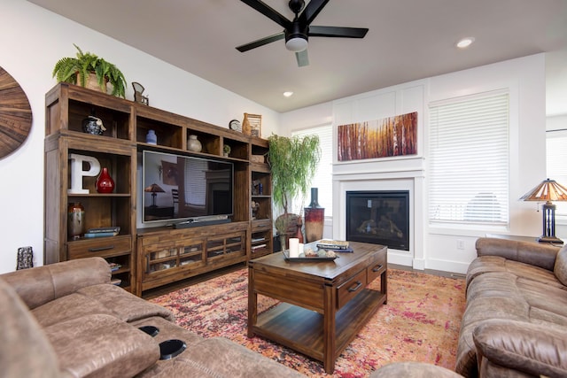 1604 N Bristol Ave, Springfield, MO 65802 - living area featuring ceiling fan, a glass covered fireplace, wood finished floors, plenty of natural light, and recessed lighting