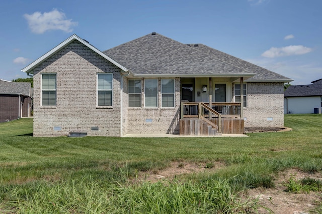 1604 N Bristol Ave, Springfield, MO 65802 - back of house featuring crawl space, brick siding, and a yard
