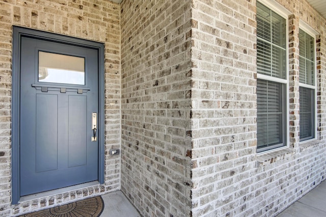 1604 N Bristol Ave, Springfield, MO 65802 - view of exterior entry featuring brick siding