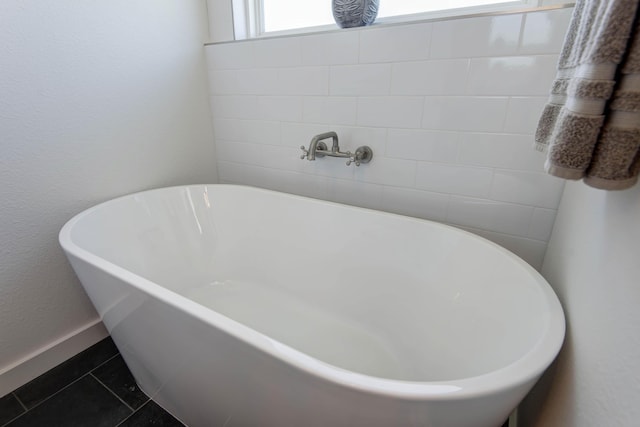 1604 N Bristol Ave, Springfield, MO 65802 - full bathroom featuring a soaking tub and tile patterned floors