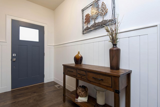 1604 N Bristol Ave, Springfield, MO 65802 - entrance foyer featuring dark wood-type flooring, a wainscoted wall, and a decorative wall