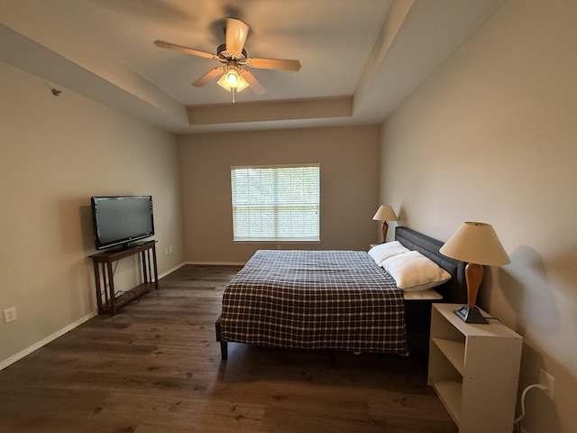 1352 N Sandy Creek Cir Unit 3, Nixa, MO 65714 - bedroom with a raised ceiling, wood finished floors, and ceiling fan