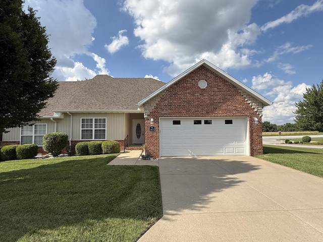 1352 N Sandy Creek Cir Unit 3, Nixa, MO 65714 - view of front of home with brick siding, driveway, an attached garage, a front lawn, and roof with shingles
