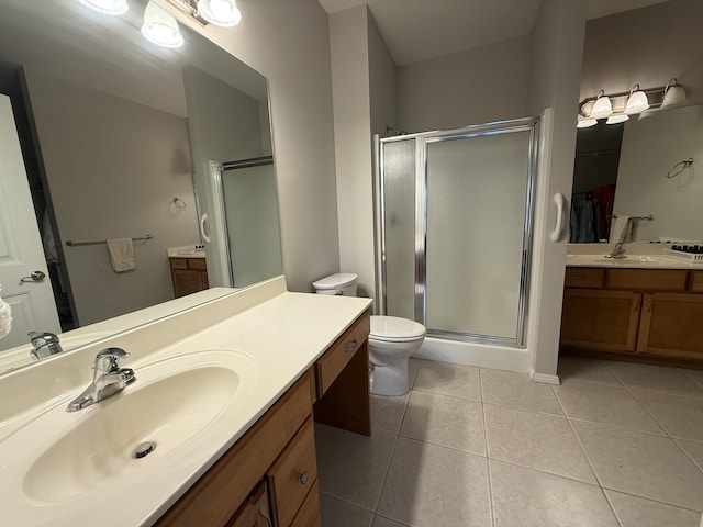 1352 N Sandy Creek Cir Unit 3, Nixa, MO 65714 - bathroom with tile patterned flooring, a stall shower, and two vanities