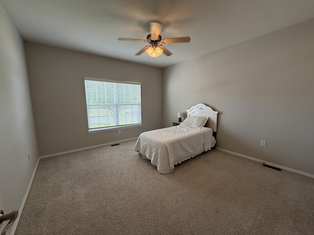 1352 N Sandy Creek Cir Unit 3, Nixa, MO 65714 - carpeted bedroom with baseboards and a ceiling fan