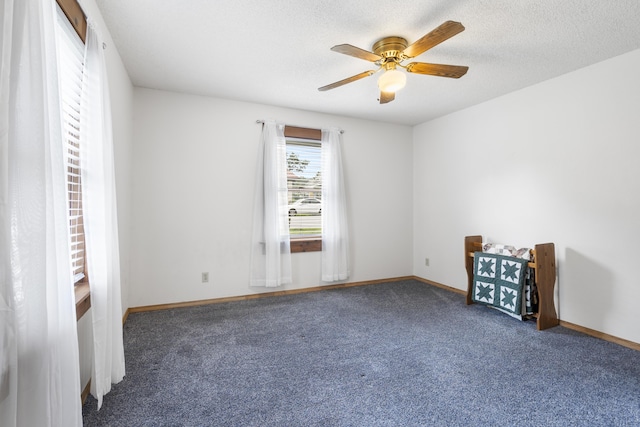 400 E Walker St, Ash Grove, MO 65604 - carpeted empty room with a ceiling fan and a textured ceiling