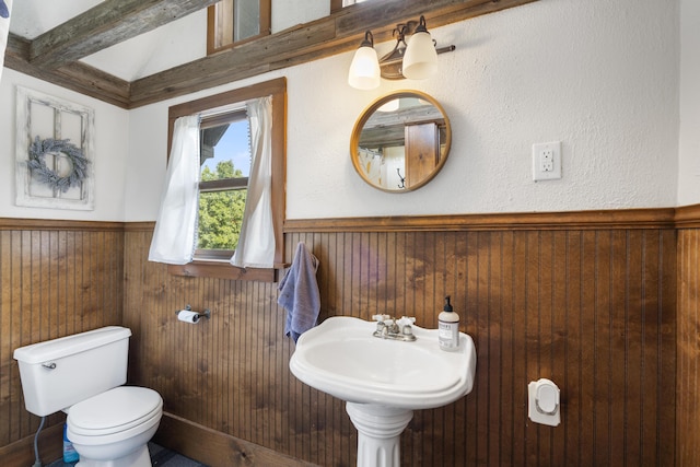 400 E Walker St, Ash Grove, MO 65604 - half bath with a wainscoted wall, wooden walls, and beam ceiling