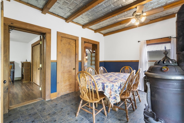 400 E Walker St, Ash Grove, MO 65604 - dining area featuring a ceiling fan, beamed ceiling, and wainscoting