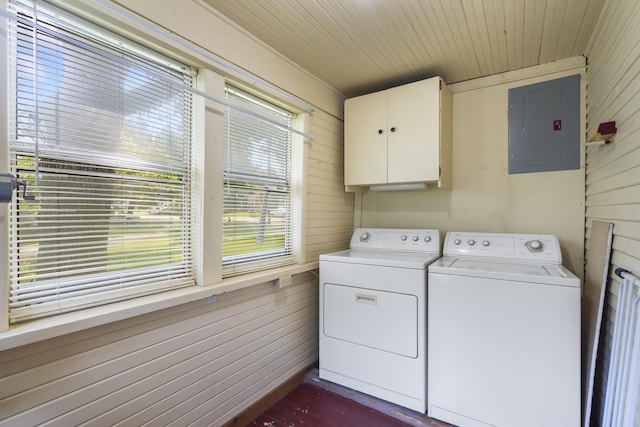 400 E Walker St, Ash Grove, MO 65604 - laundry room with electric panel, cabinet space, independent washer and dryer, and wood walls