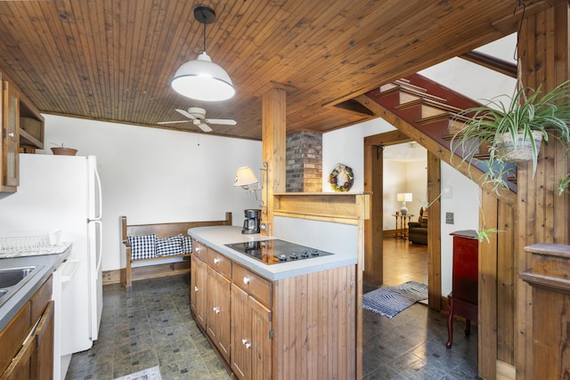 400 E Walker St, Ash Grove, MO 65604 - kitchen with black electric cooktop, a ceiling fan, dishwasher, light countertops, and decorative light fixtures