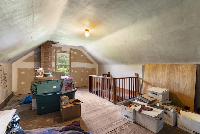 400 E Walker St, Ash Grove, MO 65604 - additional living space with lofted ceiling and wood finished floors