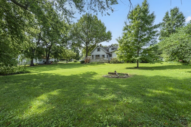 400 E Walker St, Ash Grove, MO 65604 - view of grassy yard featuring a wooden deck