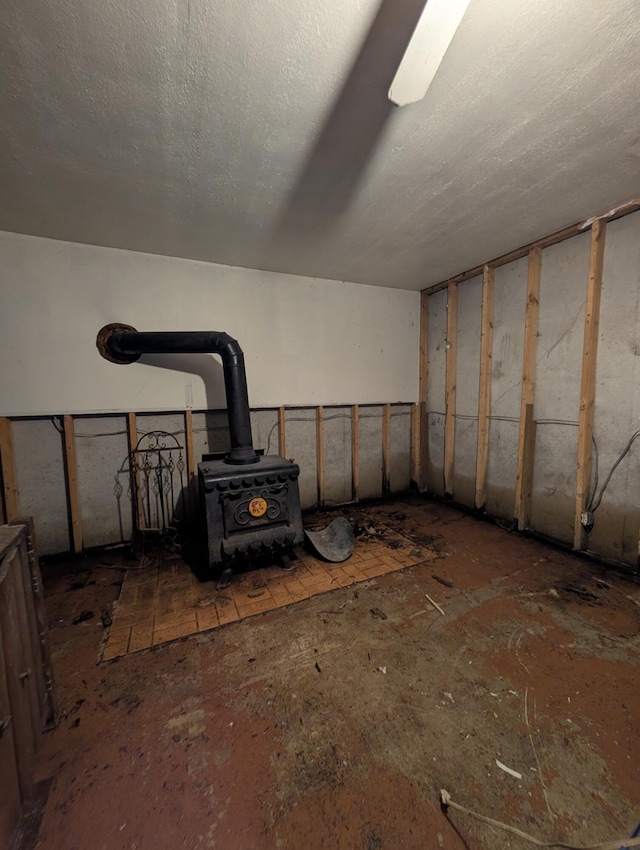 1202 S 11th St, Ozark, MO 65721 - below grade area featuring a wood stove