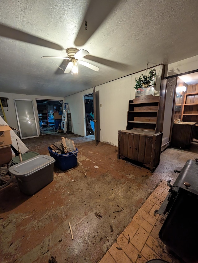 1202 S 11th St, Ozark, MO 65721 - living area featuring ceiling fan and a textured ceiling