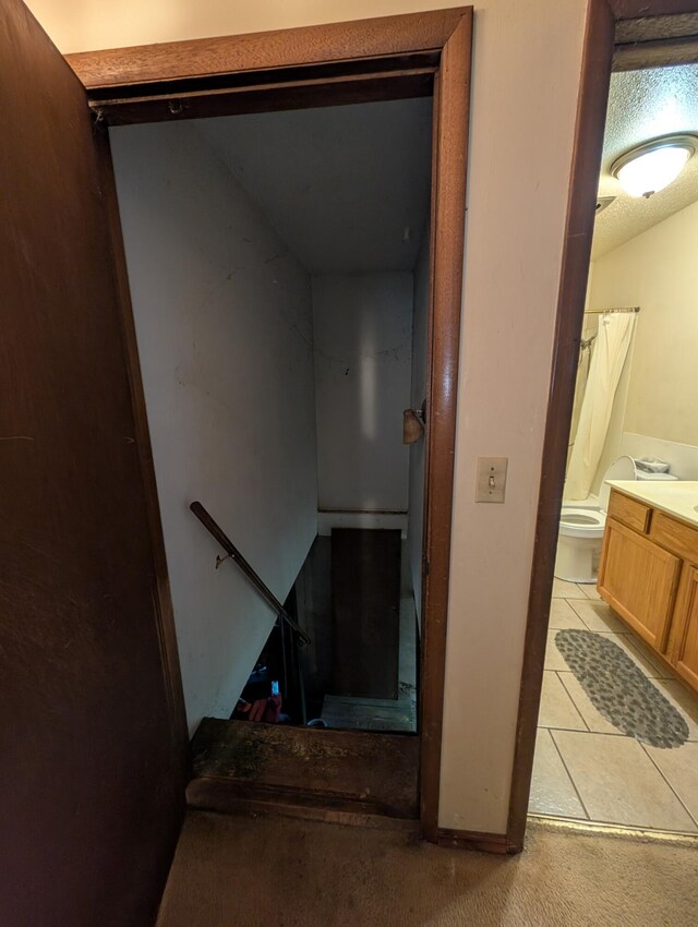 1202 S 11th St, Ozark, MO 65721 - stairs with tile patterned flooring and carpet flooring
