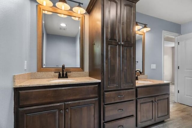 223 Roundhill Rd, Branson, MO 65616 - bathroom featuring vanity and wood finished floors