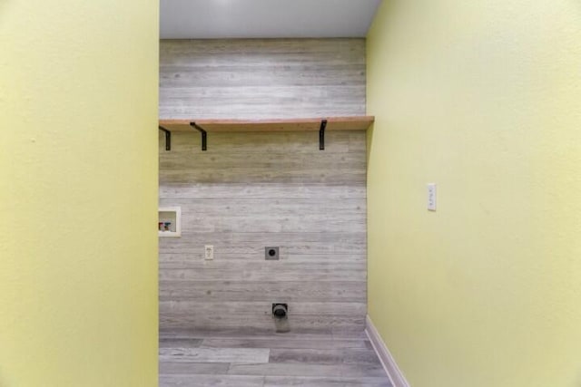 223 Roundhill Rd, Branson, MO 65616 - laundry area featuring hookup for an electric dryer, hookup for a washing machine, wood finished floors, and wooden walls