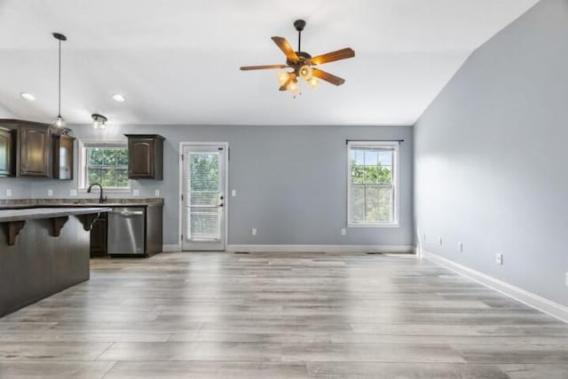 223 Roundhill Rd, Branson, MO 65616 - kitchen featuring dishwasher, a kitchen bar, plenty of natural light, ceiling fan, and recessed lighting