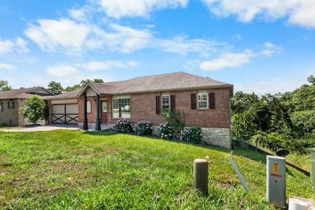 223 Roundhill Rd, Branson, MO 65616 - ranch-style house featuring brick siding, an attached garage, and a front yard
