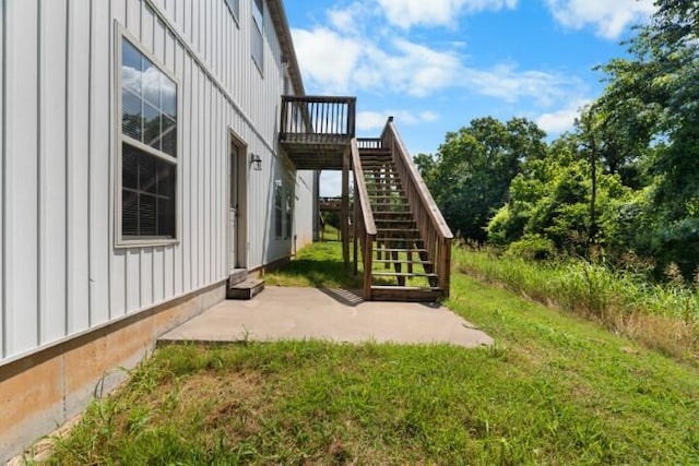 223 Roundhill Rd, Branson, MO 65616 - view of grassy yard with stairway, a deck, and a patio area