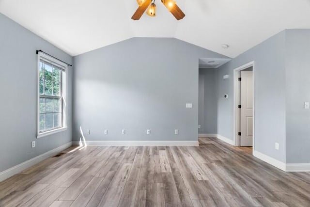 223 Roundhill Rd, Branson, MO 65616 - unfurnished room featuring a ceiling fan, light wood-style flooring, lofted ceiling, and a smoke detector