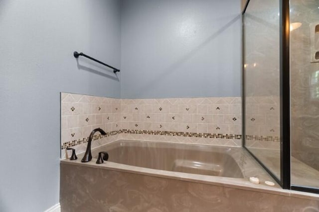 223 Roundhill Rd, Branson, MO 65616 - bathroom featuring a garden tub