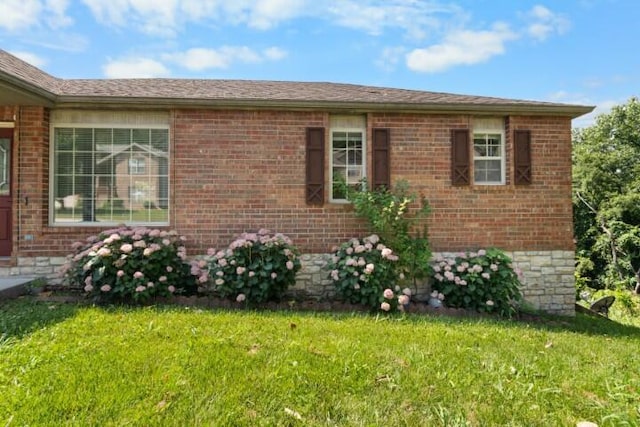 223 Roundhill Rd, Branson, MO 65616 - view of side of home with a yard and brick siding