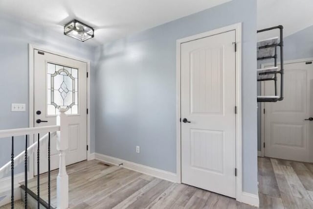 223 Roundhill Rd, Branson, MO 65616 - entryway featuring light wood-style floors and baseboards