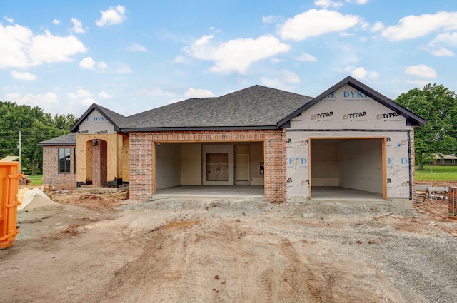 LOT20 N Silver Charm Ave, Springfield, MO 65802 - property in mid-construction with brick siding, roof with shingles, a garage, and dirt driveway
