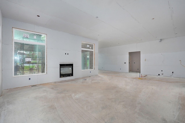 LOT20 N Silver Charm Ave, Springfield, MO 65802 - unfurnished living room with a fireplace and concrete flooring