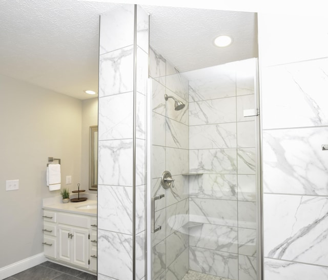 3457 S Barnes Ave, Springfield, MO 65804 - full bathroom with a stall shower, vanity, recessed lighting, and a textured ceiling