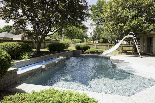 3457 S Barnes Ave, Springfield, MO 65804 - view of pool featuring a water slide and a fenced backyard
