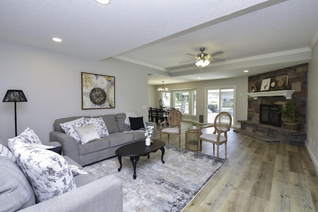 3457 S Barnes Ave, Springfield, MO 65804 - living area with light wood-style flooring, crown molding, recessed lighting, a chandelier, and a tray ceiling