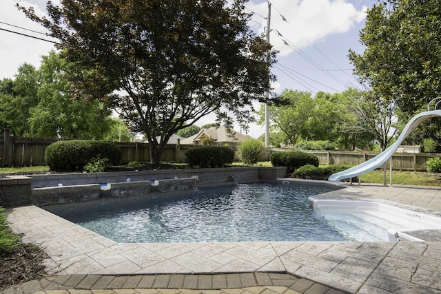 3457 S Barnes Ave, Springfield, MO 65804 - view of swimming pool featuring a water slide and a fenced backyard