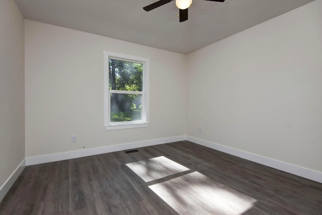1830 N Hillcrest Ave, Springfield, MO 65802 - spare room with a ceiling fan and dark wood-style flooring