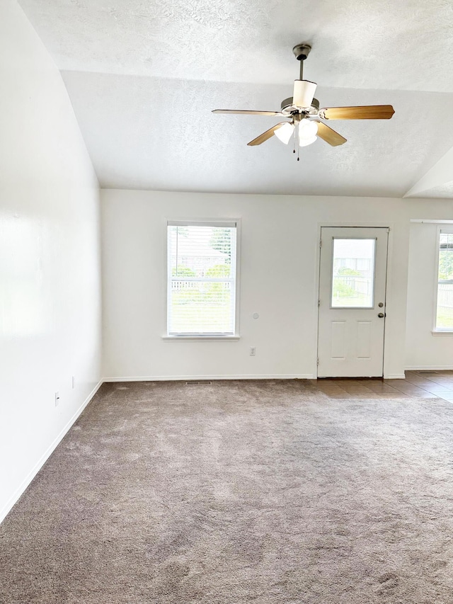 751 Logan St, Rogersville, MO 65742 - carpeted empty room featuring a textured ceiling, a ceiling fan, and lofted ceiling