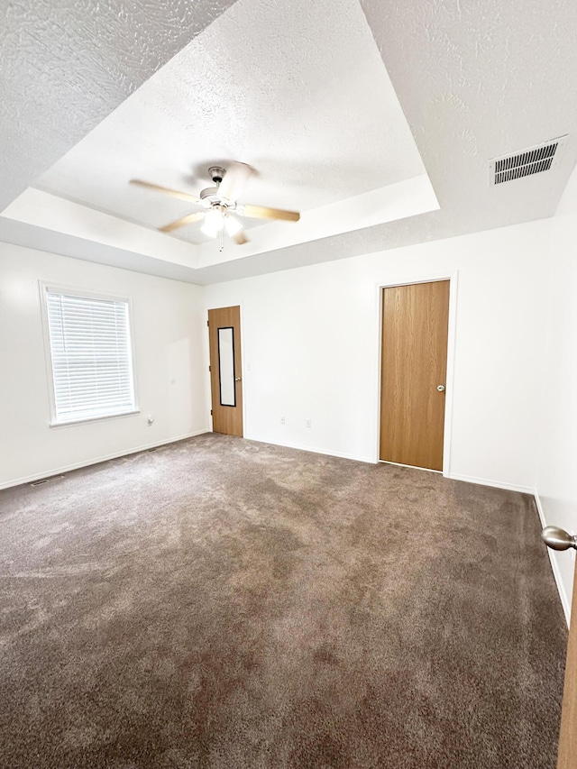 751 Logan St, Rogersville, MO 65742 - empty room with a raised ceiling, carpet flooring, a textured ceiling, and ceiling fan