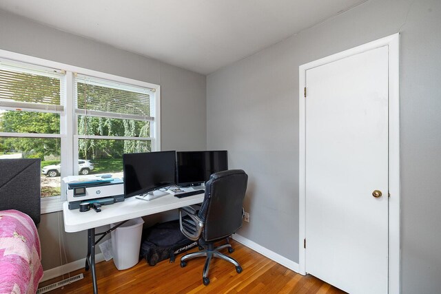 1704 E Latoka St, Springfield, MO 65804 - office area featuring wood finished floors and baseboards
