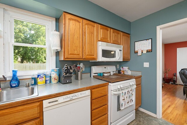 1704 E Latoka St, Springfield, MO 65804 - kitchen featuring white appliances and light countertops