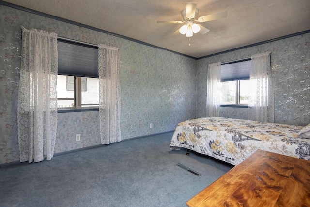 730 Peebles Point Rd, Cape Fair, MO 65624 - bedroom with wallpapered walls, carpet floors, a textured ceiling, and a ceiling fan