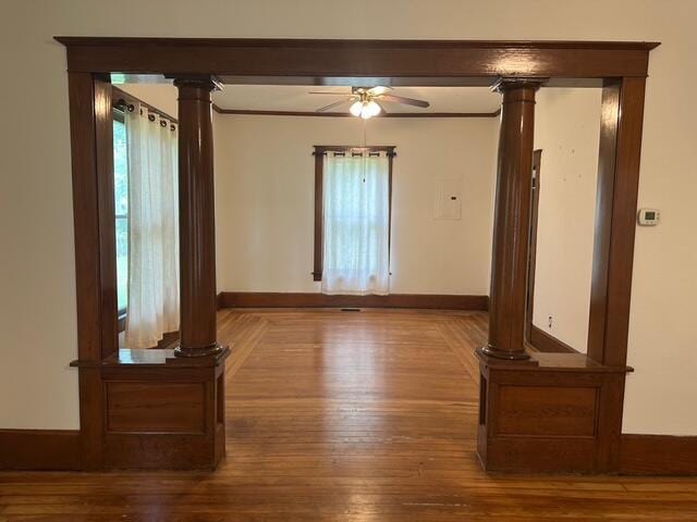 514 N Joplin Ave, Joplin, MO 64801 - unfurnished room with a ceiling fan, hardwood / wood-style flooring, healthy amount of natural light, and crown molding