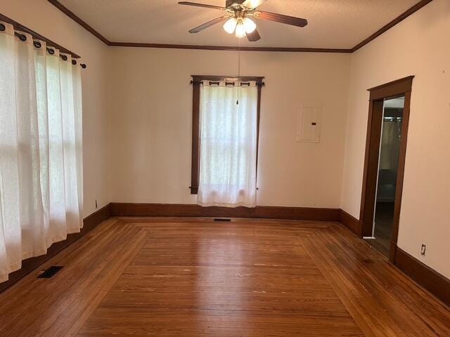 514 N Joplin Ave, Joplin, MO 64801 - spare room with ceiling fan, ornamental molding, and wood finished floors