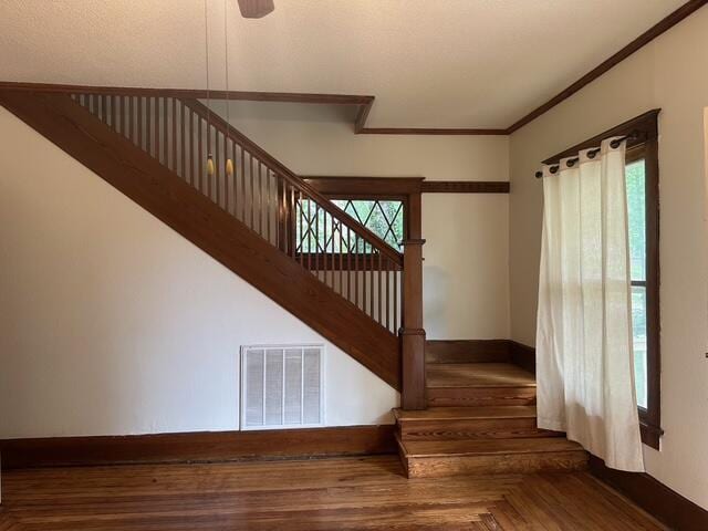 514 N Joplin Ave, Joplin, MO 64801 - stairs featuring wood finished floors and ornamental molding